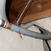 Burst Poly B Pipe Burst Poly-B pipe leaking water inside a home
